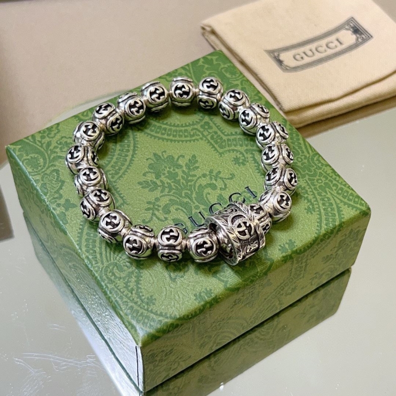 G*u*i bracelets